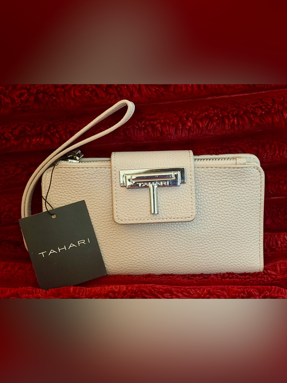 T Tahari Pale Cream Pebbled Leather Wristlet with Silver T Logo